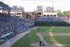 Wrigley_Rooftops_beyond_left_field_at_Wrigley_Field.jpg